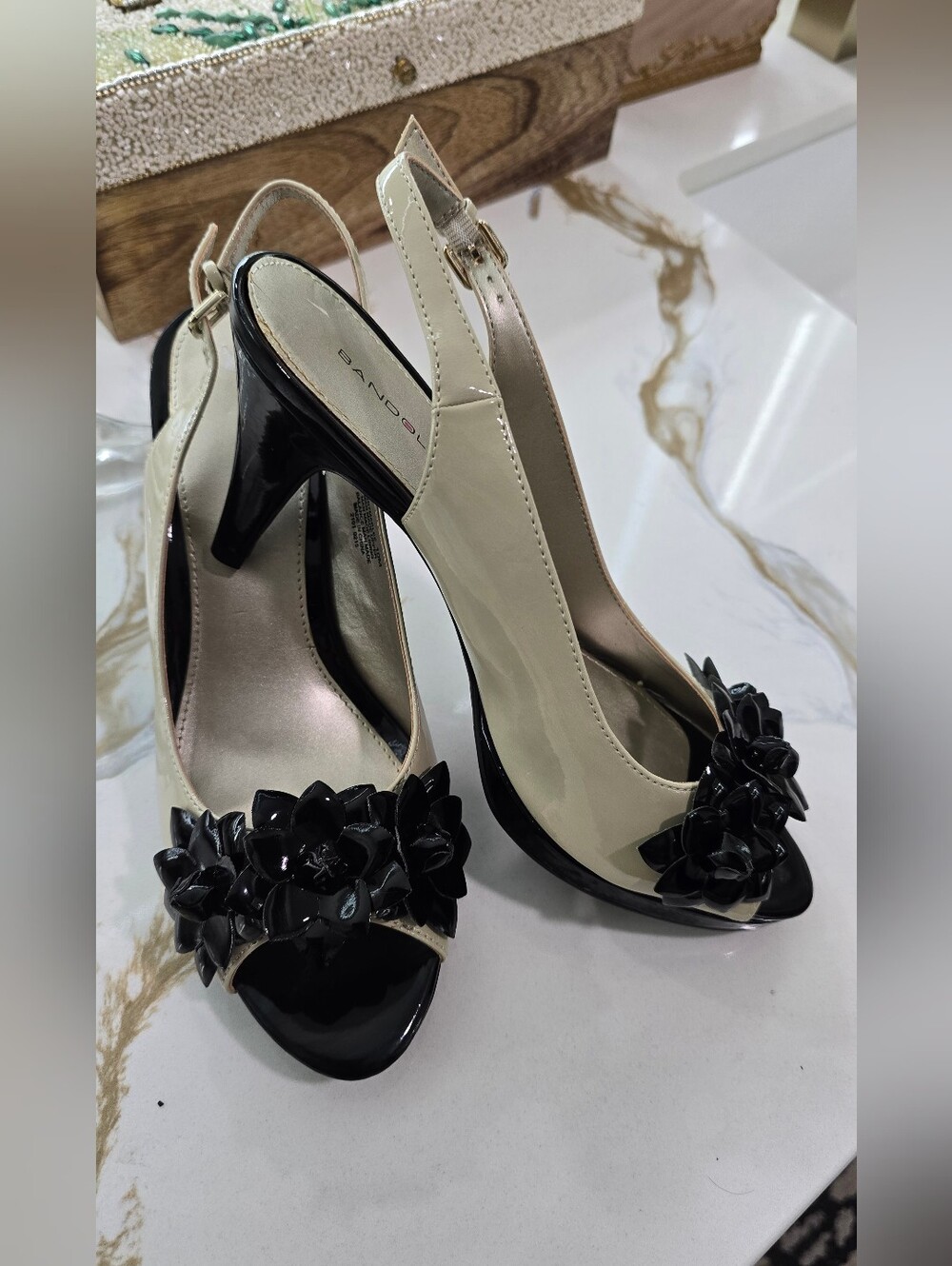 Exquisite Bandolino Ivory and Black Patent Slingback Heels with Floral Appliqués